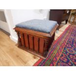 A late 19th century oak ottoman, the square upholstered top above turned supports, W. 43cm