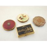 A mid 20th century gilt metal chinoiserie musical compact together with a Stratton compact decorated