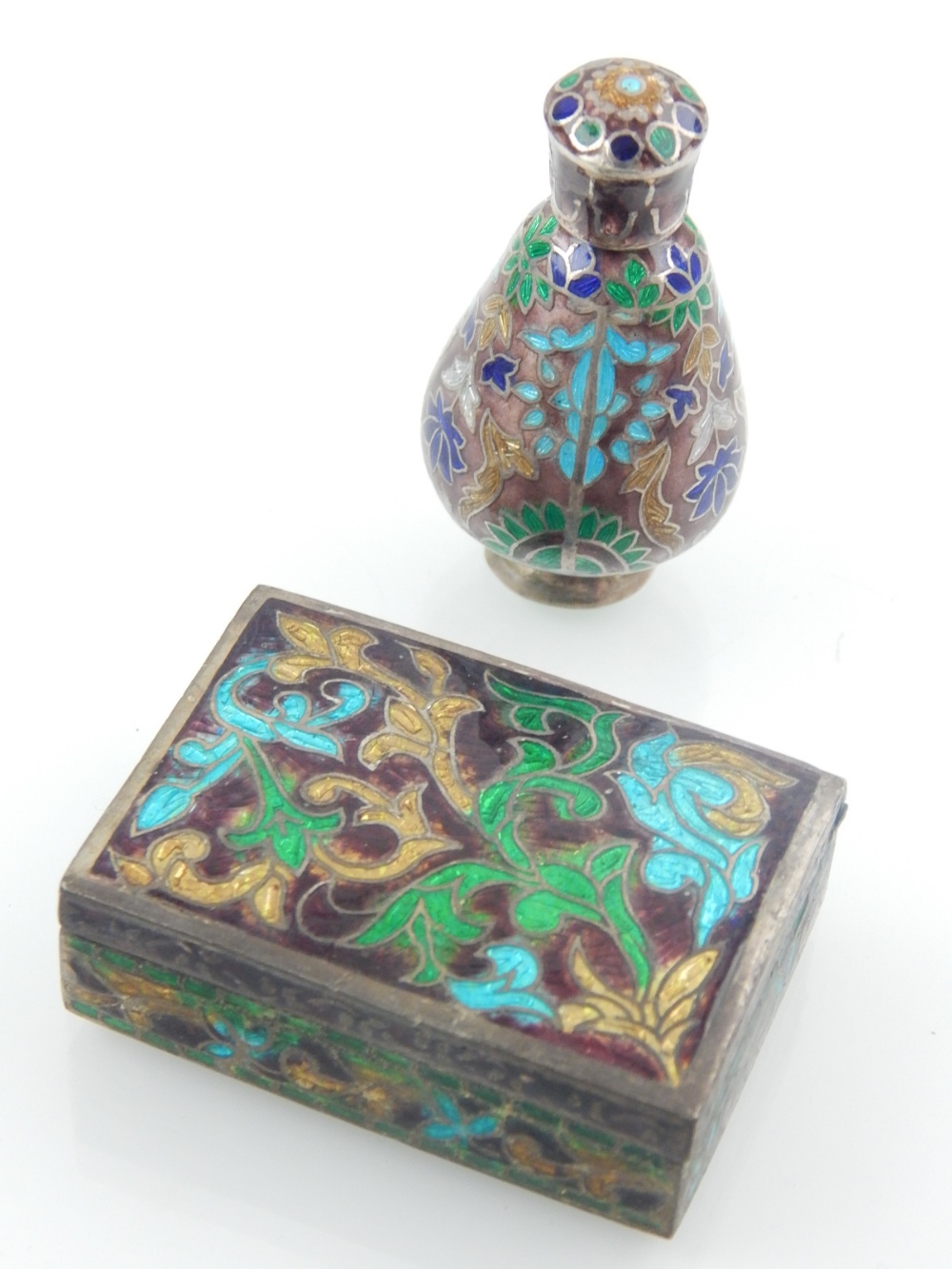 A white metal and enamelled perfume bottle and trinket box.