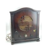 A vintage Philips radio receiver, in a mahogany case, H. 44cm.