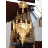 An East European, (probably Russian), gilt bronze six light chandelier, with coronet surmounts