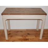 A Chippendale revival rectangular side table with cleated oak top on cream painted underframe, W.