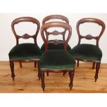 A set of four Victorian mahogany balloon back dining chairs.