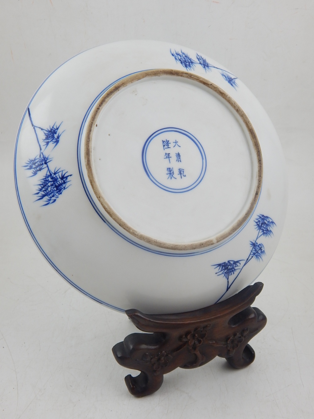 A Chinese blue and white porcelain saucer dish decorated with dragon and carp, bears six character - Image 3 of 4