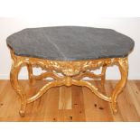 A Louis XVI design giltwood centre table, with black marble top, on cabriole legs with X-stretcher.