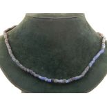 A string of mid 19th century Russian faceted blue beads. Approx. 4.5mm