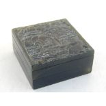 A Chinese soapstone seal, held in a hardstone case, the lid decorated with pagodas in a