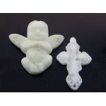Chinese jade pendants, green study of a winged child, 5cm, and a white crucifix. 4.7cm (2)