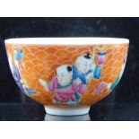 A Chinese tea bowl, orange scale background with children and lanterns, four red character stamp