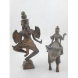 A South East Asian deity, astride a buffalo, H. 19cm, together with another deity (2).