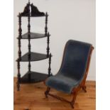 A Victorian ebonised four tier what-not, with incised gilt foliate decoration and turned supports,