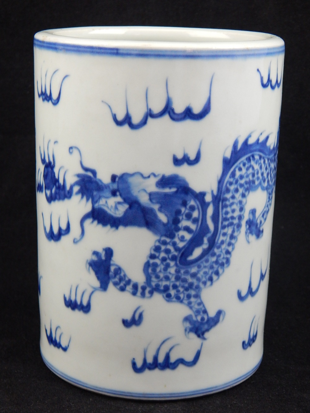 A 20th century Chinese brush pot, blue glaze decoration of dragons and flaming pearl. H. 13.5cm - Image 2 of 2