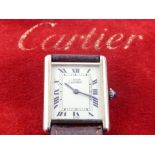 A Must De Cartier ladies silver gilt Tank style wristwatch, circa 1980, the rectangular dial with