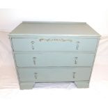 Lawrencia Furnishings, painted mid 20th century chest of drawers, oak with leaf decoration, on