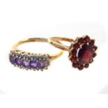 A 9ct yellow gold garnet cluster ring, and a 9ct yellow gold amethyst and diamond ring.