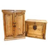 A Mexican pine wrought iron mounted wine cabinet, folding top, iron latch and handle doors revealing