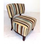 A contemporary beech side chair, upholstered in multi-coloured striped fabric.