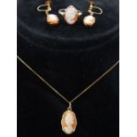 A 14ct yellow gold and cameo necklace, ring and earrings.