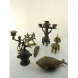 Seven South Indian bronze and brass items, comprising elephants, deities, spice and oil containers