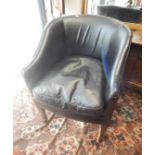 A pair of black library chairs, with tub frames on square tapered beech legs.