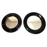 Two contemporary Indian Jane black porthole mirrors. D. 88.5cm and D. 80cm (2)