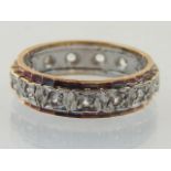 A 9ct gold and diamond eternity ring.