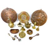 Ten various decorative Indian brass and copper items, including a spice box, spoons, bells, a pair