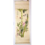 A Chinese scroll, painted with birds on foliage.
