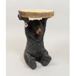 Bavarian style occaisional table modelled as a seated bear holding a tree section