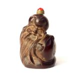 Chinese carved snuff bottle in the form of the god of Longevity Shou Xing, jade stopper,