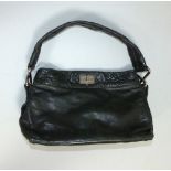 Chanel black leather hobo handbag, with quilted strap and and top edge,