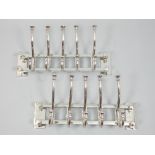 Pair of contemporary chrome five branch hanging coat racks