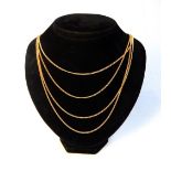 Four contemporary gold plated necklaces, each approx. 52cm, 5.6g.