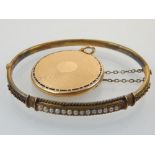 15ct gold bangle with pearl decoration,