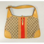 Gucci monogram ladies hobo handbag, with brown leather details,