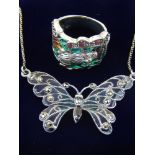 A silver and plique a jour butterfly necklace, and a silver and plique a jour ring,