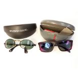 Pair of Prada sunglasses, cased,