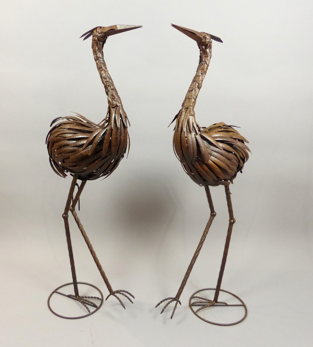 Pair of contemporary bronzed strip metal ornaments of standing cranes, H. - Image 2 of 2