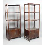 Pair of Chinese four tier etagere over double door cupboard, brass furnishings, bar legs, 151.