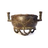 Chinese bronze censor, lug handles, faux bamboo rim and applied decoration and feet, 13.