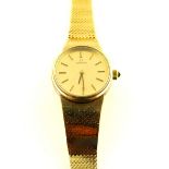 Omega, ladies 9ct gold automatic wristwatch, oval champagne dial with baton markers, integral