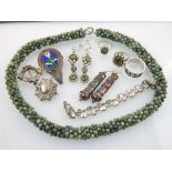 Contemporary peridot and pearl jewellery, a beaded necklace, enamel and silver brooch for the