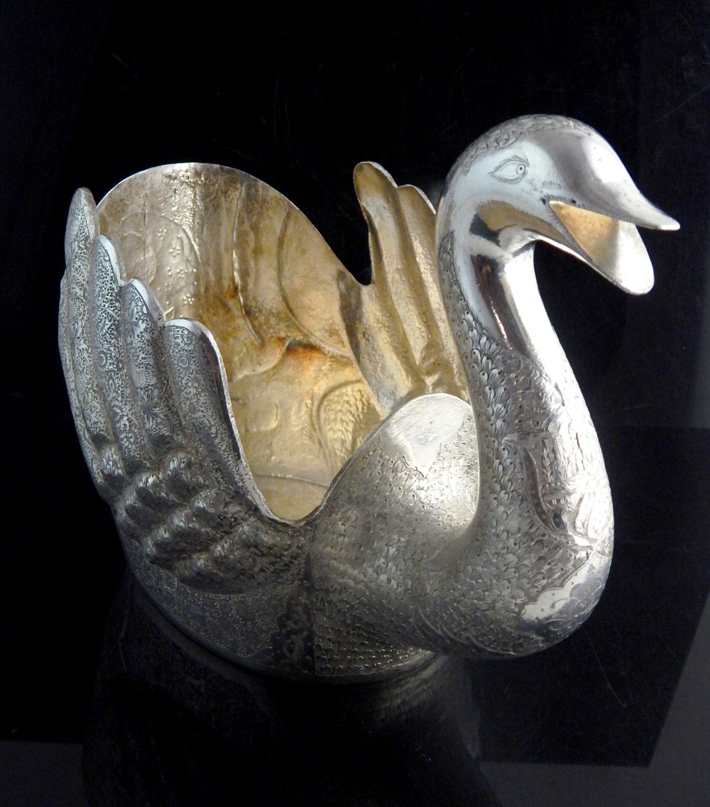 Fine Persian silver swan centrepiece, the whole intricately engraved on repousse modelling,