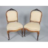 Fine pair of 19th C carved walnut chairs, contemporary upholstered back and set,