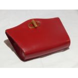 Dunhill, a ladies red evening clutch bag, with matching vanity mirror in stitched leather, 22.