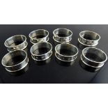 Matching set of eight oval silver napkin rings, c.