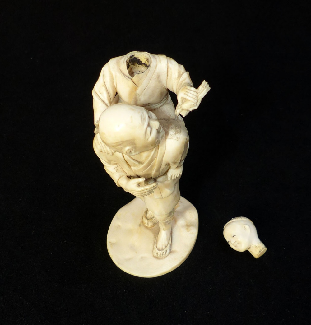 Late 19th C Japanese carved ivory group of a fisherman carrying his son who is holding a crab, - Image 4 of 5