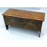 17th C oak six plank coffer with moulded hinge top over a chip and lunette carved front,