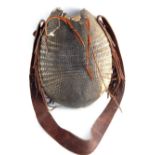 Vintage tribal armadillo skin bag with leather strap and tassels,