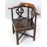 Mid 18th C Provincial elm and fruitwood corner elbow chair with twin pierced splat over a solid